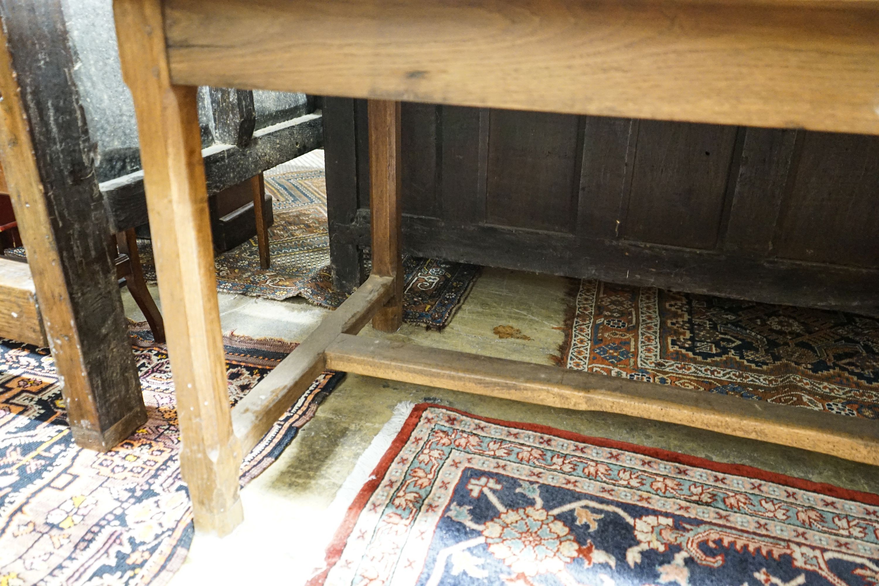 A Cotswold style oak and pine refectory table, with single pine drawer to one end, width 203cm, depth 80cm, height 73cm